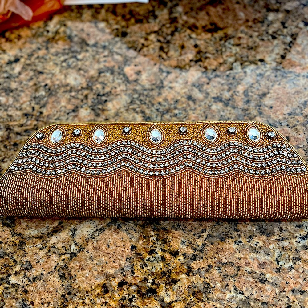 Gold clutch bag